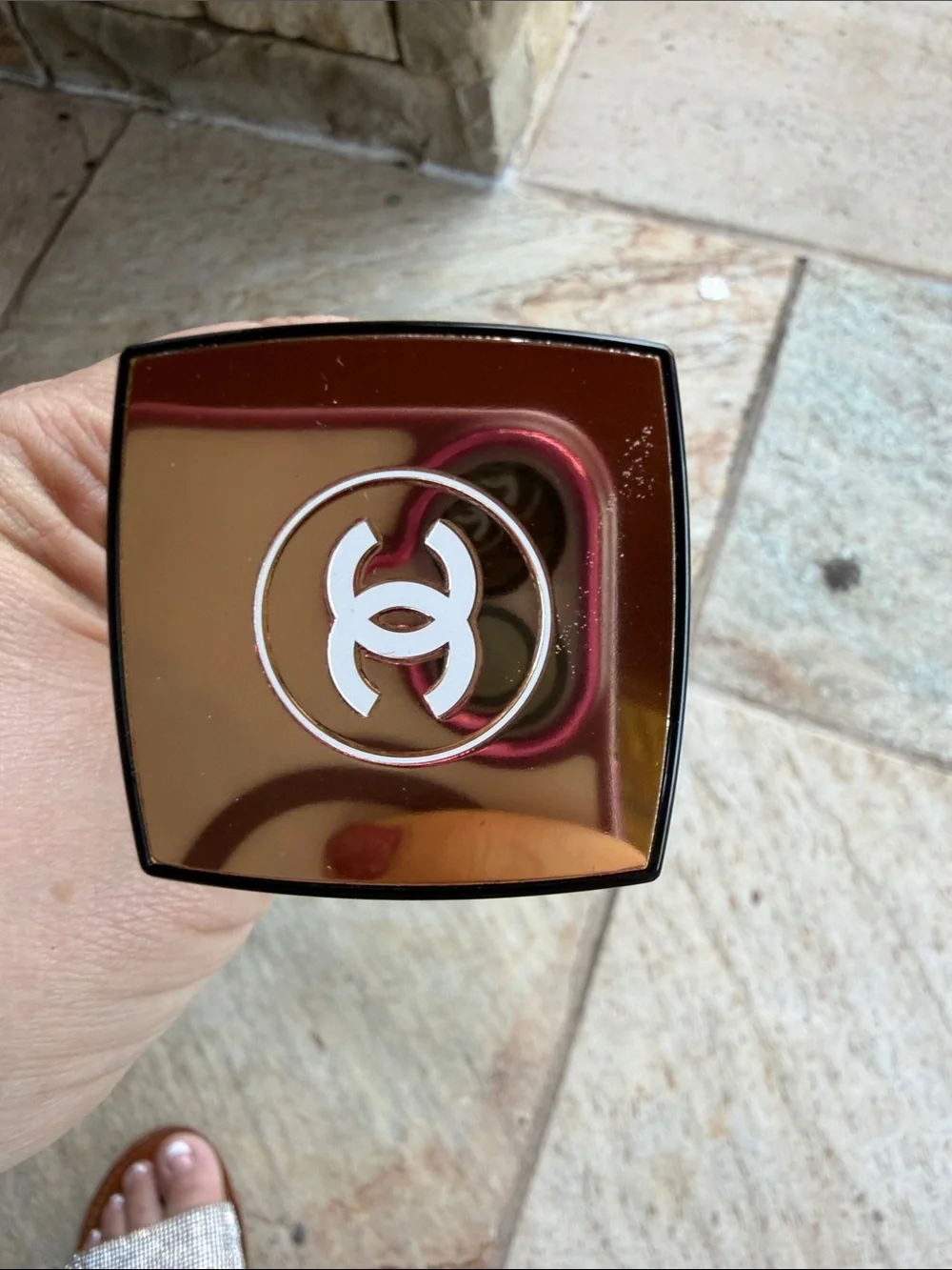 CHANEL  — Clear Bottle with Black Cap and Golden Liquid